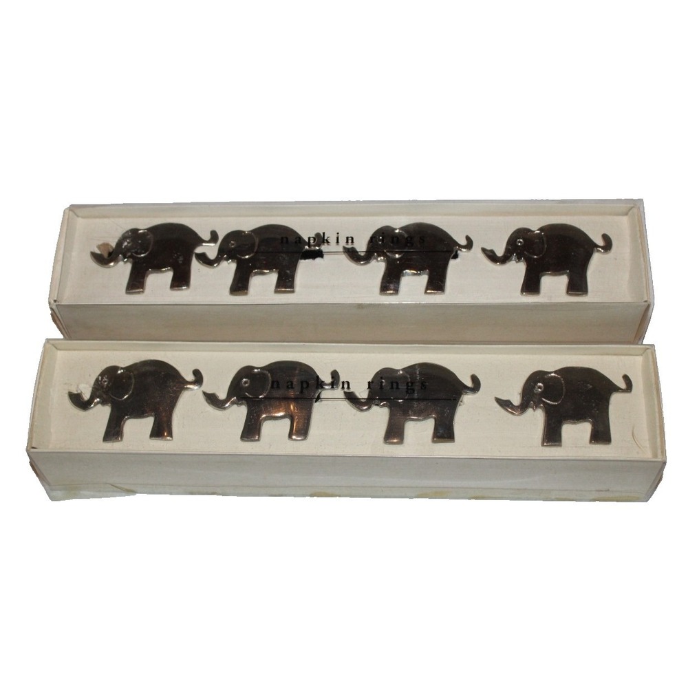 set of 8 Pier One nickel plated elephant napkin rings trunks up (2 boxes of 4)